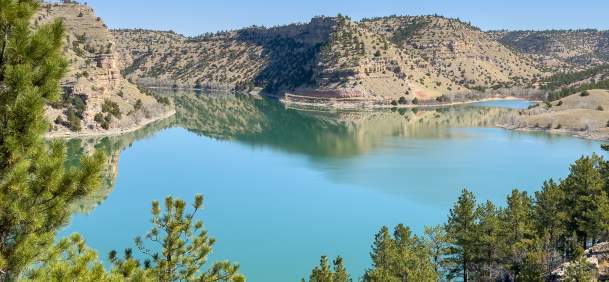 Located in the scenic high-desert of Platte County, Wyoming, Guernsey State Park is a 6,000-acre oasis that blends rugged natural beauty with a fascinating historical legacy.