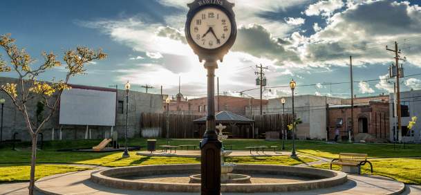 Historic downtown Rawlins, Wyoming, featuring brick buildings and a quiet park.