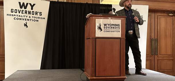 Wyoming Office of Tourism hosting a presentation to a crowd