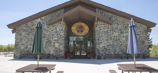 Exterior of the Museum of the Mountain Man with picnic tables in Pinedale, Sublette County, Wyoming