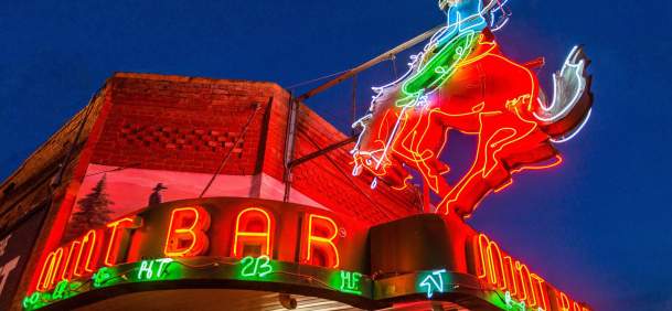The iconic Mint Bar with its neon sign on Main Street in Sheridan, Sheridan County, Wyoming.