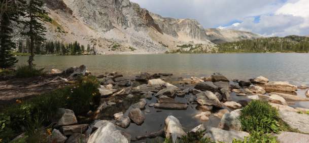 Snowy Range's Lake Marie surrounded by pine trees and rugged peaks in Albany County, Wyoming