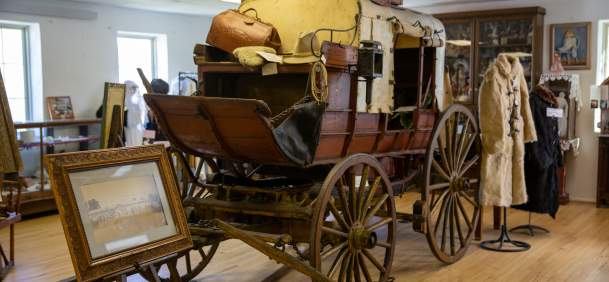 Located at 322 S. Main Street in the heart of Lusk, the Stagecoach Museum is a massive repository of frontier history that serves as the cultural anchor for Niobrara County. Housed in a repurposed Wyoming National Guard Armory, the museum offers an immersive look at the "Cheyenne-Deadwood" era and the rugged survival of early Wyoming settlers.
