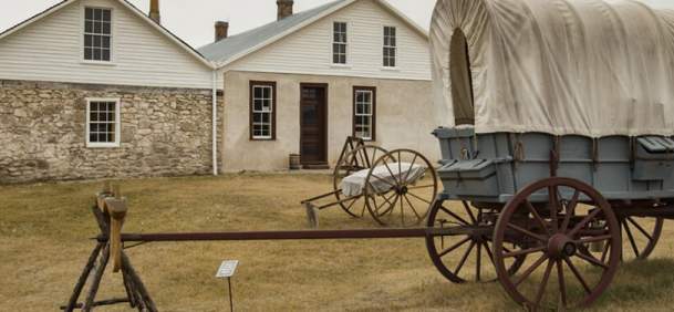 Historic Fort Laramie with wagen and open grasslands in Goshen County, Wyoming.
