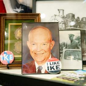 Historic photograph of President Eisenhower displayed inside the Red River Railroad Museum