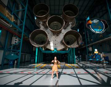 Woman in front of shuttle