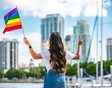 Woman with rainbow flag