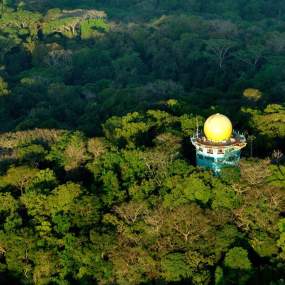 Aerial view of the Canopy Tower, a bird watching place surrounded by a lot of vegetation in Soberania National Park