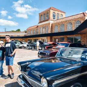 Classic cars in front of Raos on Calder Ave for Art Festival.