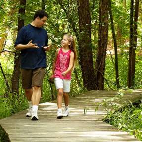 Father and Daughter on Trail Hike in Southeast Texas