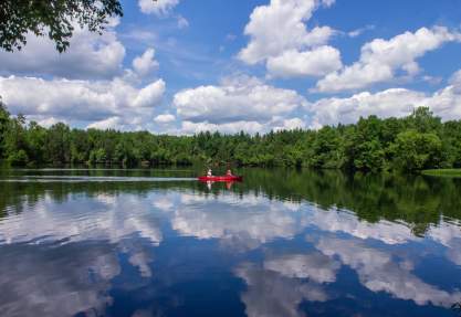 kayaking on the lake during the summer