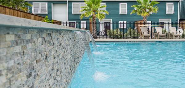 Water fall over pool ledge