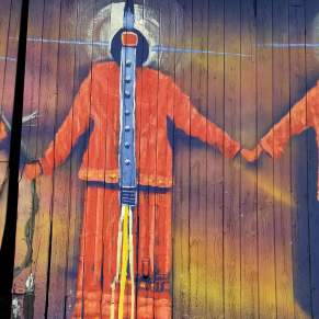 Get to know the artist behind "A Song for Seven Sisters" mural, Chris Sweet.