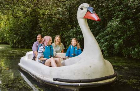 A family on a swan pedalo.