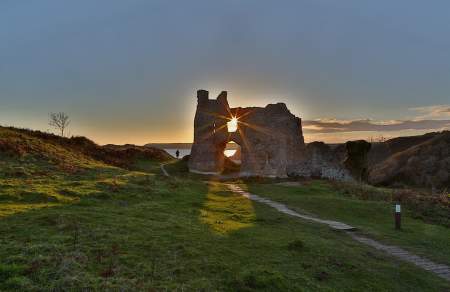 Sunlight pouring through castle ruin
