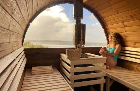 woman relaxing in a sauna at Ty Sawna in oxwich