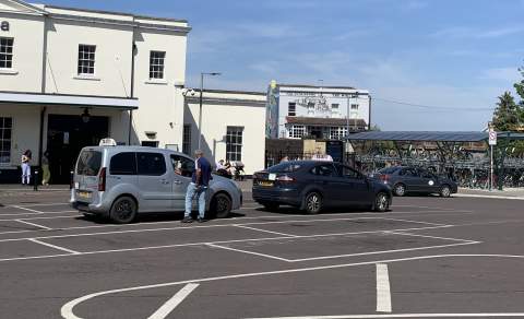 Taxis outside Cheltenham Spa Train Station.