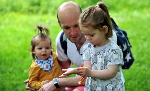 Children in the Cotswolds with a ladybird