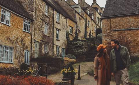 Steph & Tom, aka Bean & Bear, walk down the Chipping Steps in Tetbury