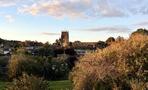 Winchcombe at golden hour with the church in the distance
