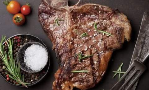 photo of a steak and salt and rosemary