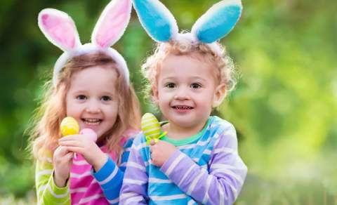 two children with easter eggs
