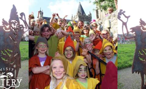 Pixie statues and children dressed as Ottery pixies