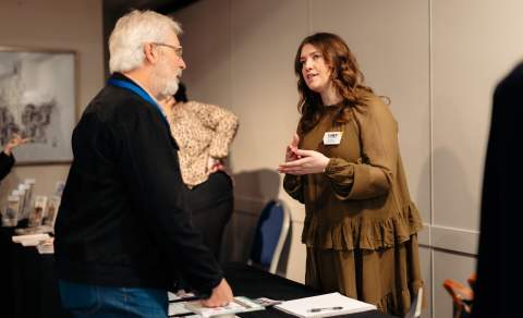 VHEY colleague speaking to delegate at VHEY Tourism Conference 2026