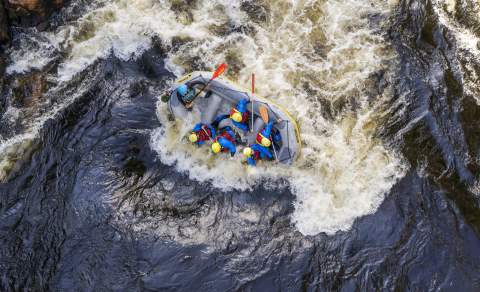 Rafting boat in waves