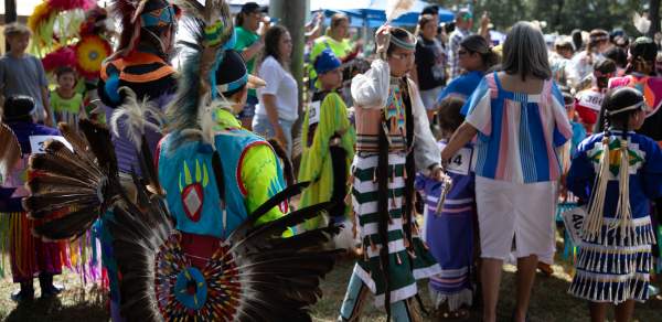 Group of people dressed in Native American clothing
