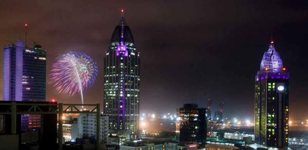 fire works exploding in the sky in downtown mobile alabama