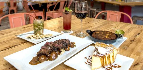 a table set with food at a restaurant in mobile al