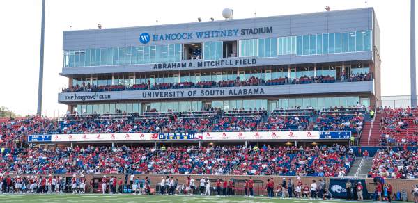 Whitney Stadium Football field with fans in the stands
