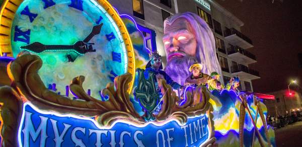 Mardi Gras float with father time and a clock