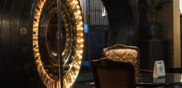 Lighted vault door, table and chairs