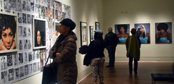People Enjoying Art In A Mobile, AL Art Gallery