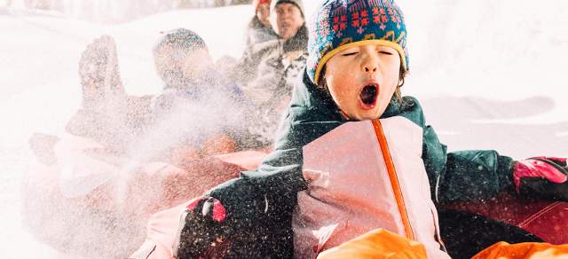 Family snow tubing at Winter Park Resort