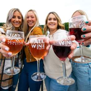 women holding wine glasses at Montage Mountain Fall Wine Festival