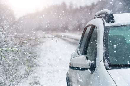 Car on Snowy Road