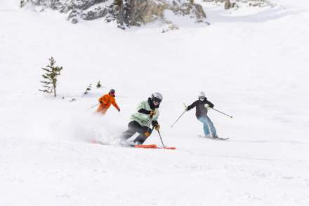 Skiers going down a run at Snowbird Resort.