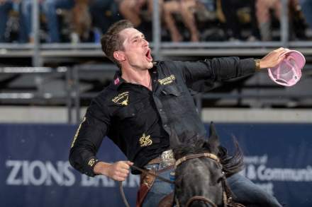 The photo is of Ben Anderson riding a horse with his cap in hand at the Utah Days of 47 Rodeo