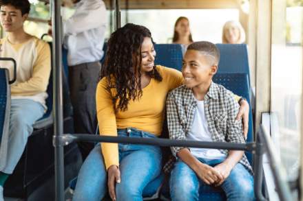 A mother and son on a Utah Transit Authority Bus.