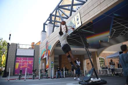 Hard-N-Paint, a basketball league for youth and adults, offers visitors an authentic look into street basketball.