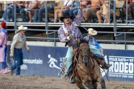 Keenan Hayes riding a horse, with one hand at the Big Show 87 hosted by Utah Days of '47 Rodeo