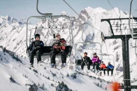 Skiers on the ski lift