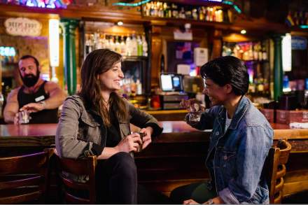 Couple drinking at bar in Salt Lake