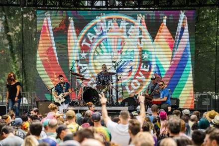 Image of a crowd watching a band play at Utah Pride in 2019