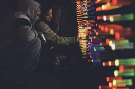 Festival goers explore engaging scientific concepts illuminated through art.