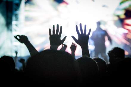Salt Lake City Concert-goer in the crowd raising their hands