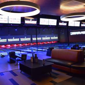 An interior shot with bowling lanes at Uptown Alley, inside Manassas Mall.